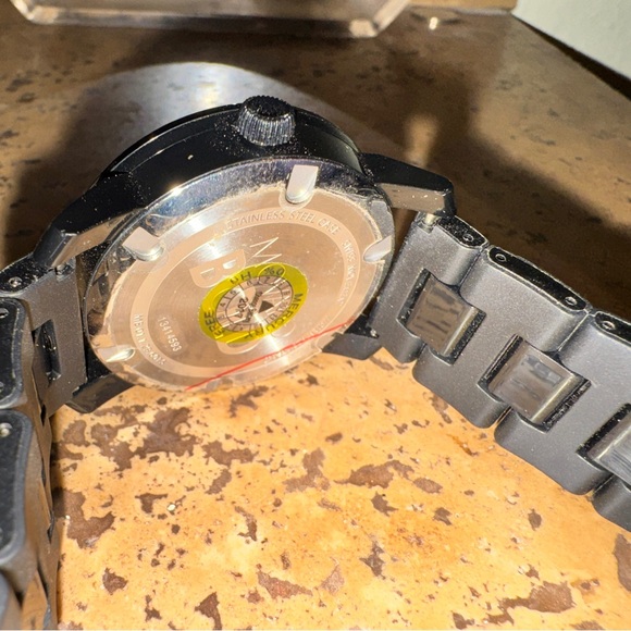 Movado Black Watch with Blue Accents - Picture 2 of 3